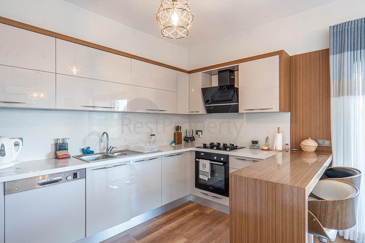 Дуплекс 2+1 с террасой и садом в центральной части Бодрума в шаговой доступности к морю