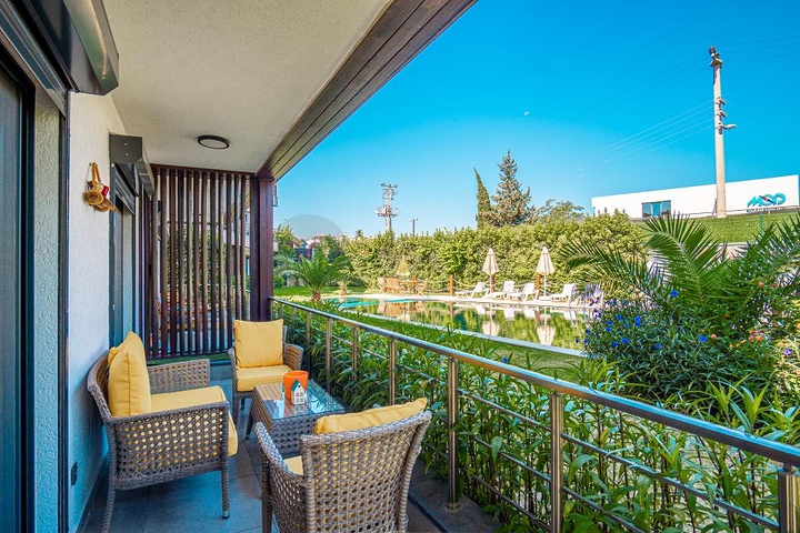 Дуплекс 2+1 с террасой и садом в центральной части Бодрума в шаговой доступности к морю