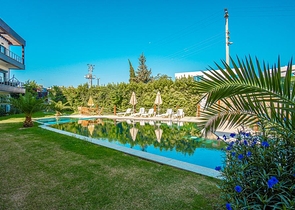 Дуплекс 2+1 с террасой и садом в центральной части Бодрума в шаговой доступности к морю