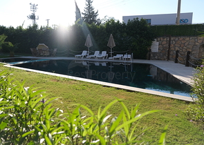 Дуплекс 2+1 с террасой и садом в центральной части Бодрума в шаговой доступности к морю