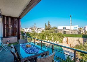 Дуплекс 2+1 с террасой и садом в центральной части Бодрума в шаговой доступности к морю