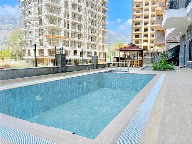 Продается квартира 1+1 в районе Махмутлар