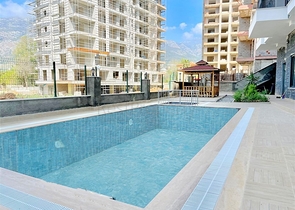 Продается квартира 1+1 в районе Махмутлар