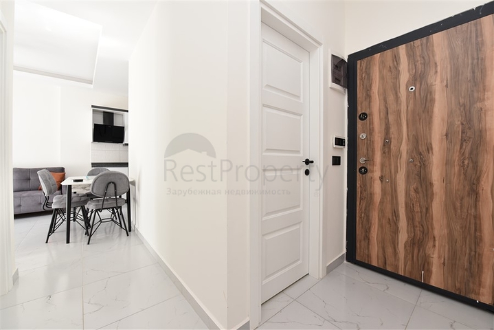 Двухкомнатная квартира в районе Махмутлар