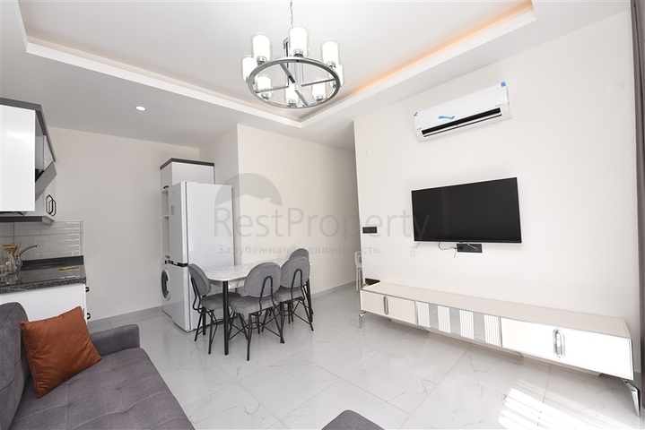 Двухкомнатная квартира в районе Махмутлар