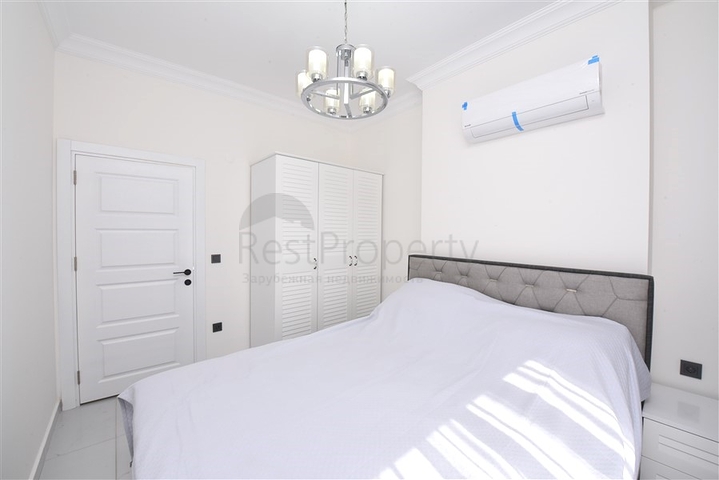 Двухкомнатная квартира в районе Махмутлар