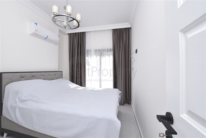 Двухкомнатная квартира в районе Махмутлар