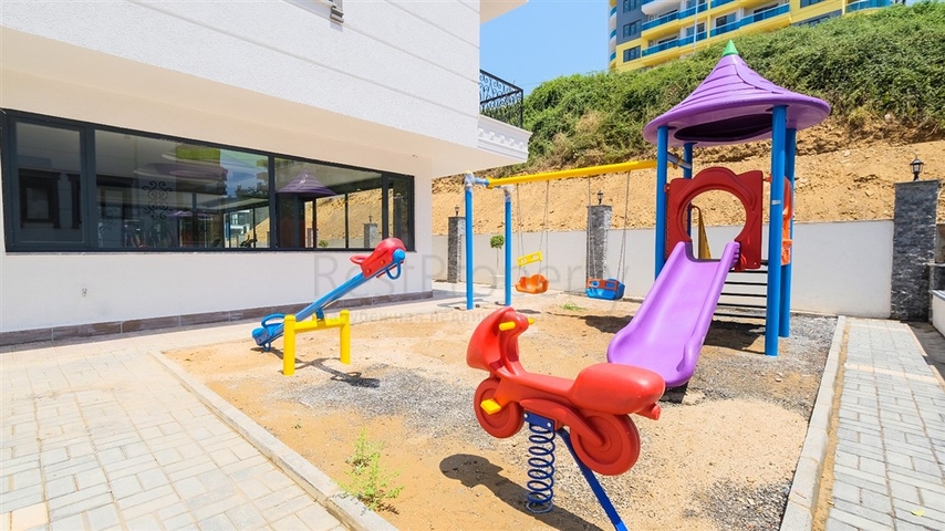 Двухкомнатная квартира в районе Махмутлар