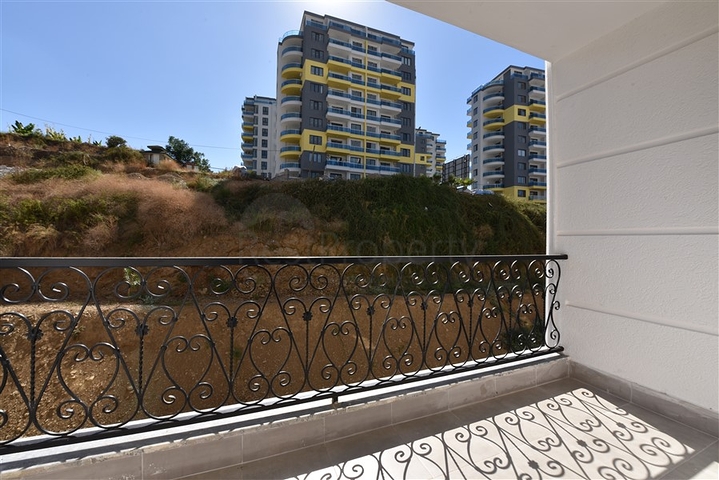 Двухкомнатная квартира в районе Махмутлар