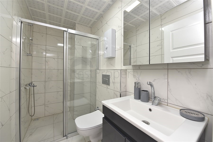 Двухкомнатная квартира в районе Махмутлар