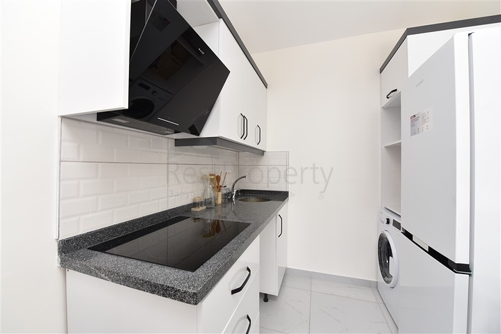 Двухкомнатная квартира в районе Махмутлар