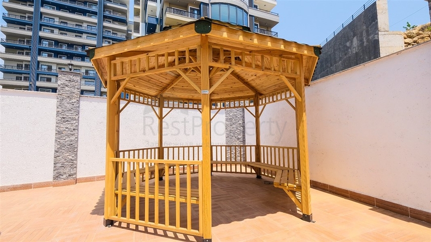 Двухкомнатная квартира в районе Махмутлар