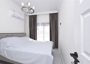 Двухкомнатная квартира в районе Махмутлар