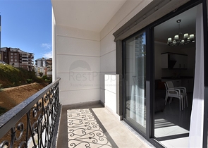 Двухкомнатная квартира в районе Махмутлар