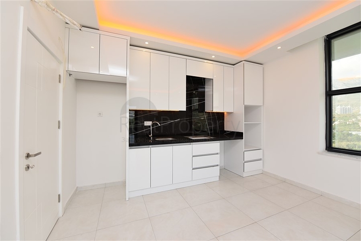 Апартаменты 2+1 в элитном жилом комплексе в Махмутларе