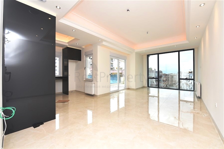 Трёхкомнатная квартира в премиальном жилом комплексе в районе Махмутлар