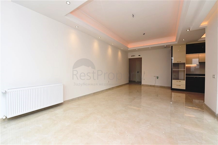 Трёхкомнатная квартира в премиальном жилом комплексе в районе Махмутлар