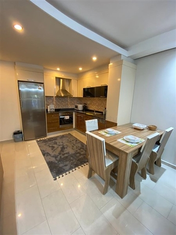 Квартира 1+1 в Махмутларе с выходом в сад