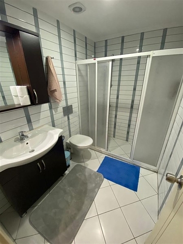 Квартира 1+1 в Махмутларе с выходом в сад