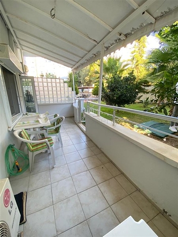 Квартира 1+1 в Махмутларе с выходом в сад