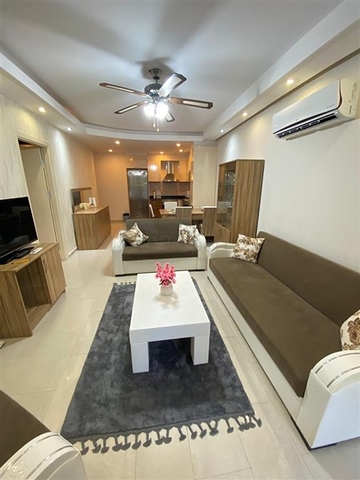 Квартира 1+1 в Махмутларе с выходом в сад