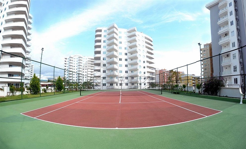 Квартира 1+1 в Махмутларе с выходом в сад