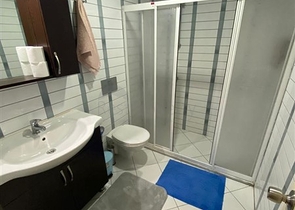 Квартира 1+1 в Махмутларе с выходом в сад