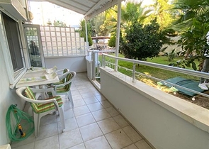 Квартира 1+1 в Махмутларе с выходом в сад