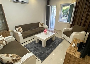 Квартира 1+1 в Махмутларе с выходом в сад