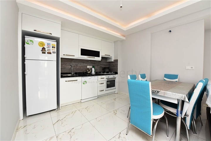 Просторная квартира 1+1 в районе Махмутлар