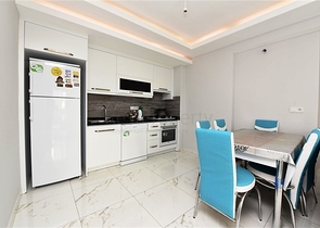 Просторная квартира 1+1 в районе Махмутлар