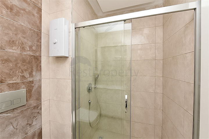 Двухкомнатная квартира с панорамным видом в Авсалларе