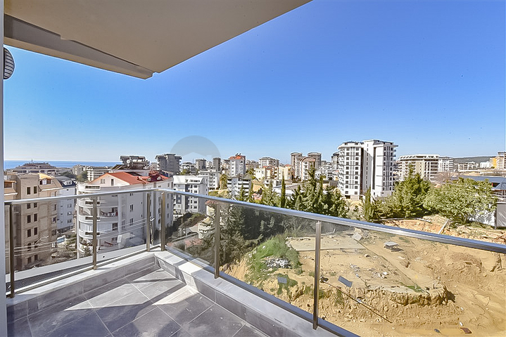 Двухкомнатная квартира с панорамным видом в Авсалларе