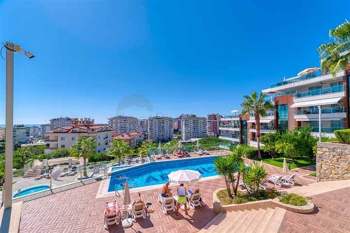 Трехкомнатная квартира в районе Джикджилли 