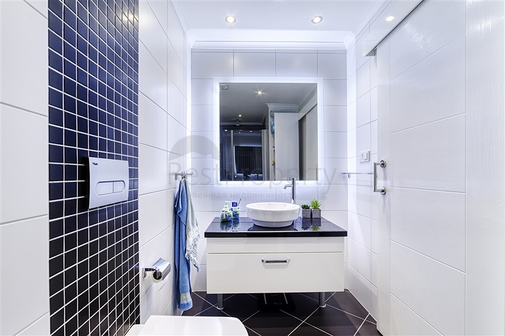 Трехкомнатная квартира в районе Джикджилли 