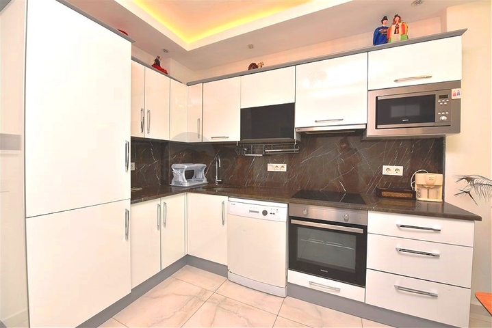 Апартаменты планировкой 1+1 в уютном комплексе в Махмутларе 