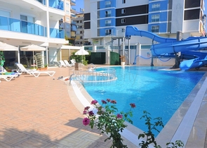 Апартаменты планировкой 1+1 в уютном комплексе в Махмутларе 