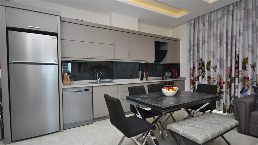 Квартира 1+1 в районе Махмутлар 