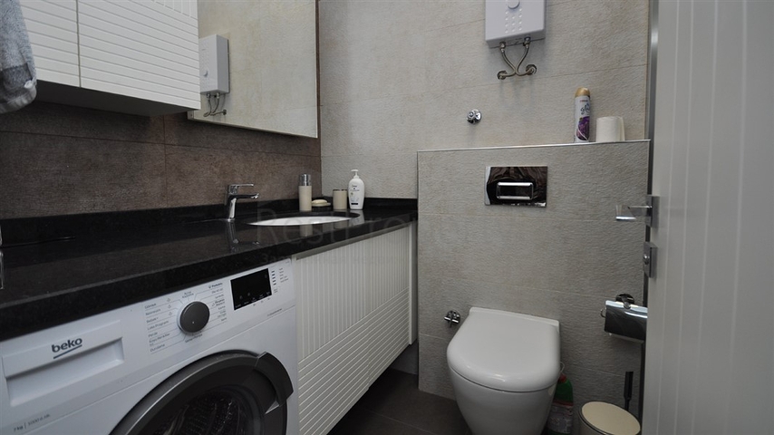 Квартира 1+1 в районе Махмутлар 