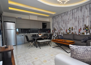 Квартира 1+1 в районе Махмутлар 