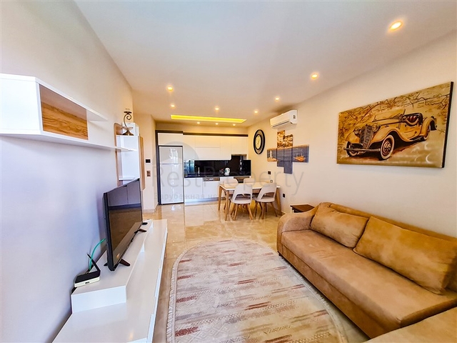 Квартира 1+1 на первой линии в районе Махмутлар 