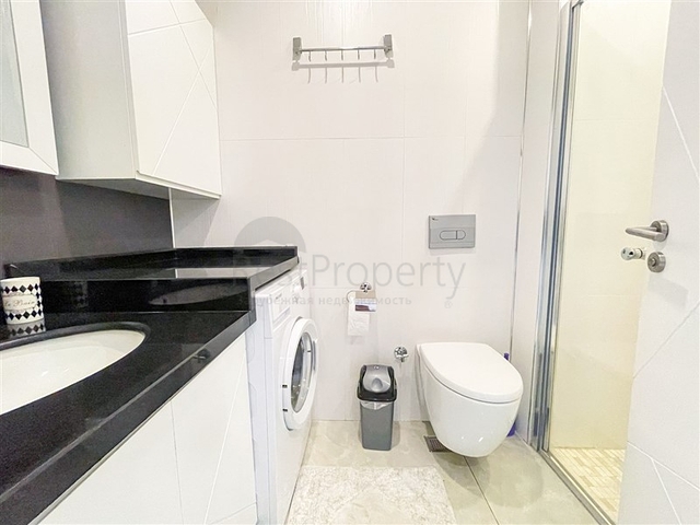 Квартира 1+1 на первой линии в районе Махмутлар 