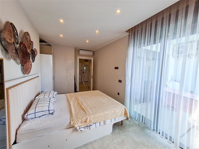 Квартира 1+1 на первой линии в районе Махмутлар 