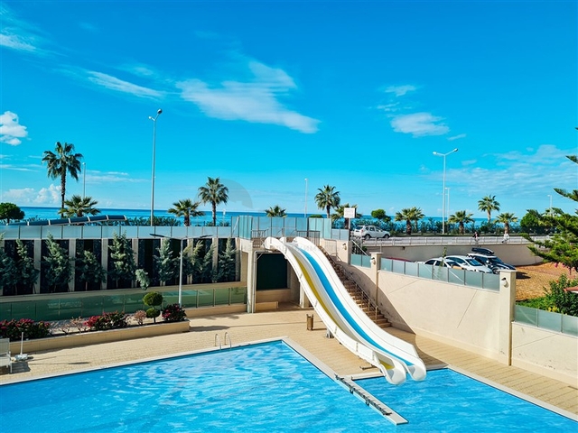 Квартира 1+1 на первой линии в районе Махмутлар 