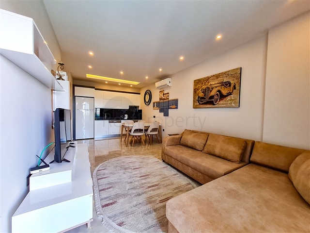 Квартира 1+1 на первой линии в районе Махмутлар 