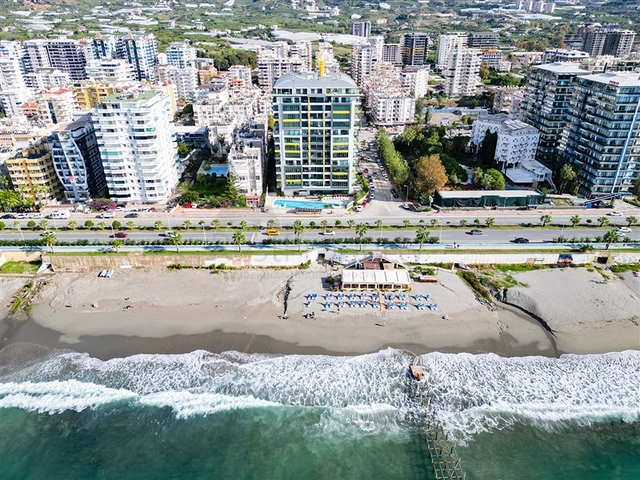 Квартира 1+1 на первой линии в районе Махмутлар 