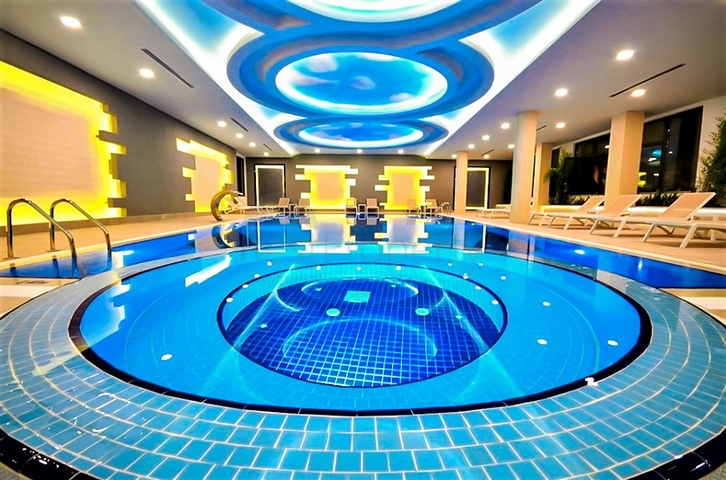 Квартира 1+1 на первой линии в районе Махмутлар 