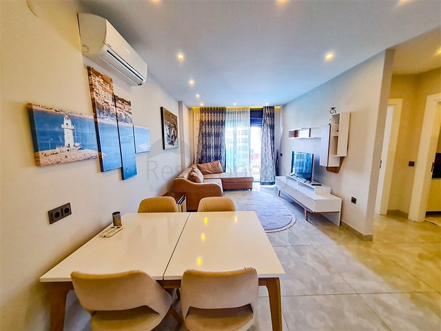 Квартира 1+1 на первой линии в районе Махмутлар 