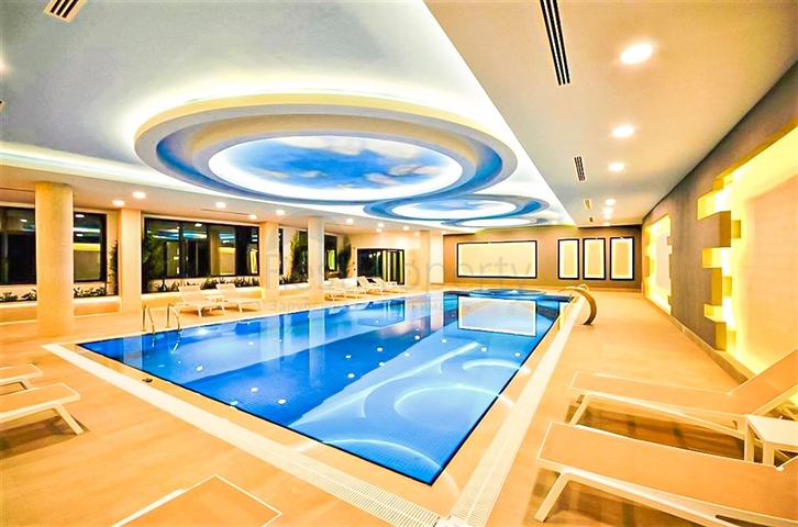 Квартира 1+1 на первой линии в районе Махмутлар 