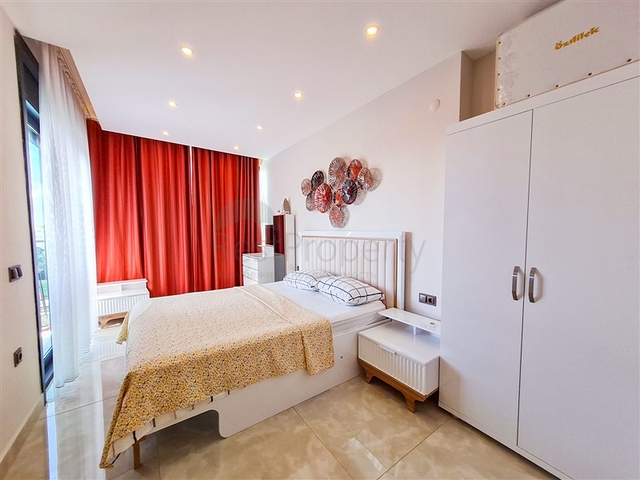 Квартира 1+1 на первой линии в районе Махмутлар 